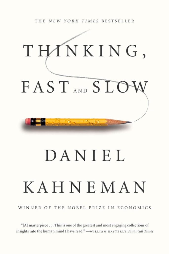 Cover of Daniel Kahneman's "Thinking, Fast and Slow," detailing System 1 and System 2 cognitive processing.